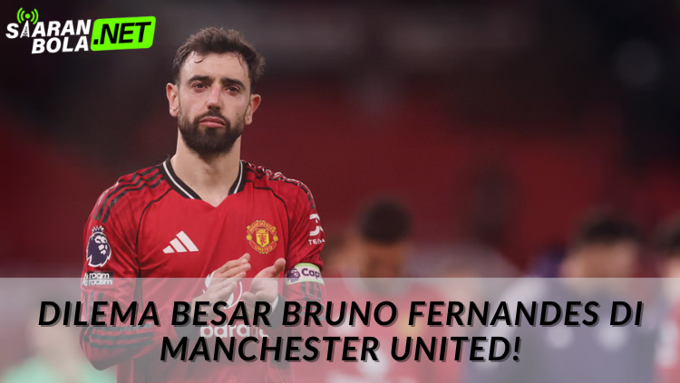 Bruno Fernandes, kapten Manchester United, terlihat serius di pinggir lapangan Old Trafford, dengan ekspresi kontemplatif menyusul berita klausul transfer rahasia sebesar €65 juta. - siaranbola.net