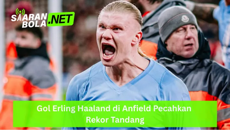 Foto close-up ekspresi Erling Haaland dari Manchester City berteriak kencang dengan mulut terbuka lebar saat merayakan gol di Stadion Anfield, mengenakan jersey biru muda, terdapat logo SIARANBOLA.NET hijau di pojok kiri atas dan teks "Gol Erling Haaland di Anfield Pecahkan Rekor Tandang" pada bilah hijau di bagian bawah.
