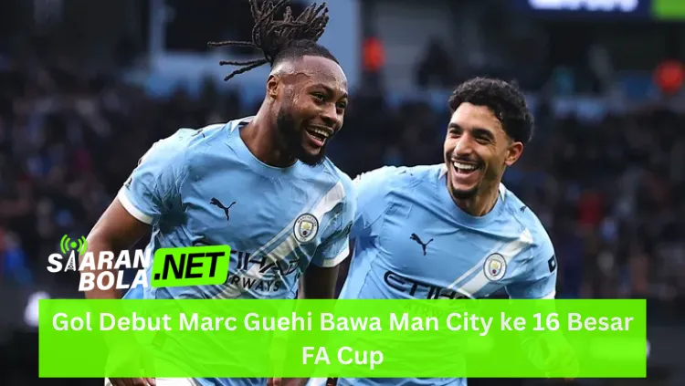 Dua pemain Manchester City merayakan gol dengan gembira; Marc Guehi dengan gaya rambut dreadlocks tersenyum lebar bersama rekan setimnya yang merangkul bahunya; keduanya mengenakan jersey biru langit khas City; terdapat logo SIARANBOLA.NET hijau di pojok kiri bawah dan teks "Gol Debut Marc Guehi Bawa Man City ke 16 Besar FA Cup" pada bilah hijau terang di bagian bawah.